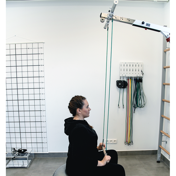 Ćwiczenia w pozycji siedzącej z drążkiem